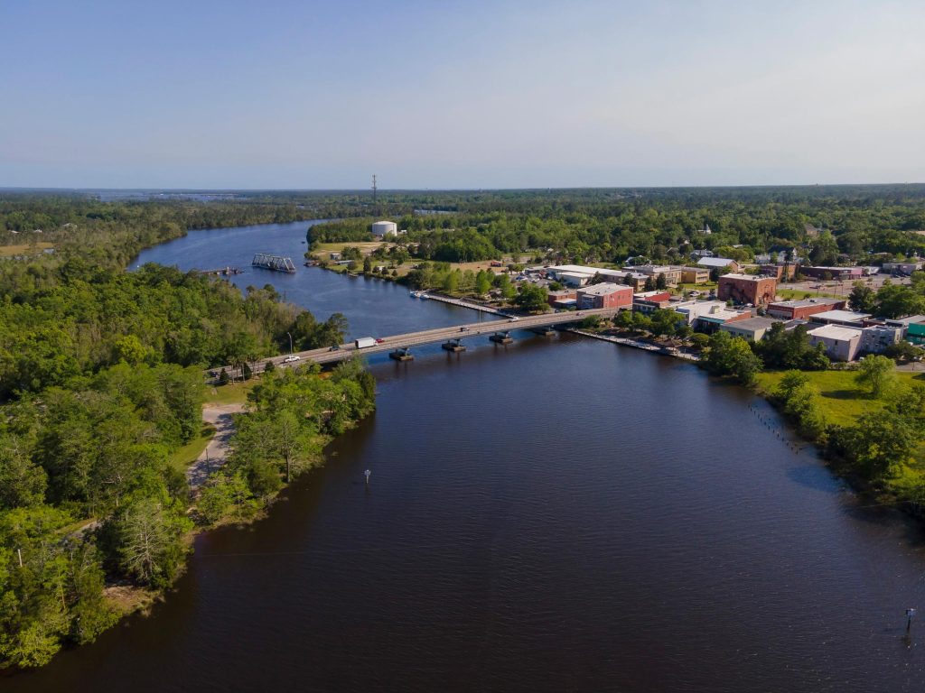 Aerial shot view of a highway bridge and swing bridge at Milton